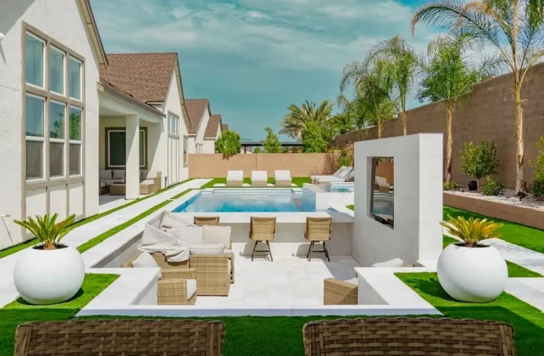 Luxurious backyard pool with lounge seating